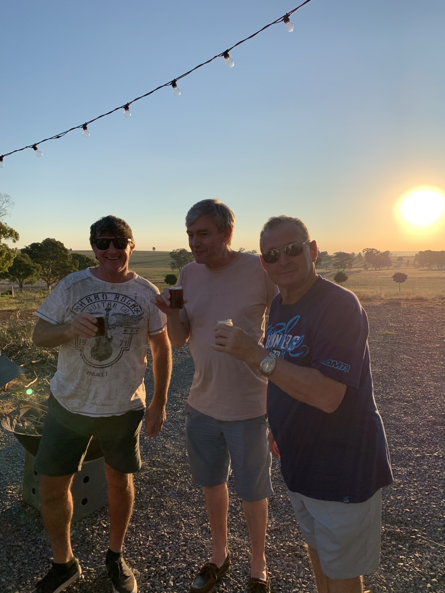 3 men drinking beer