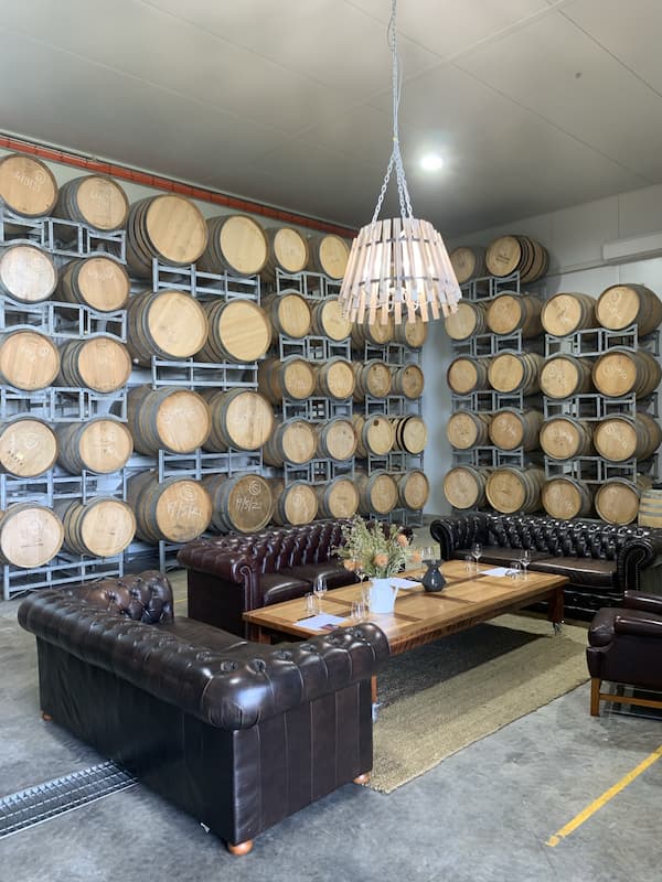 wine barrels in winery storage shed
